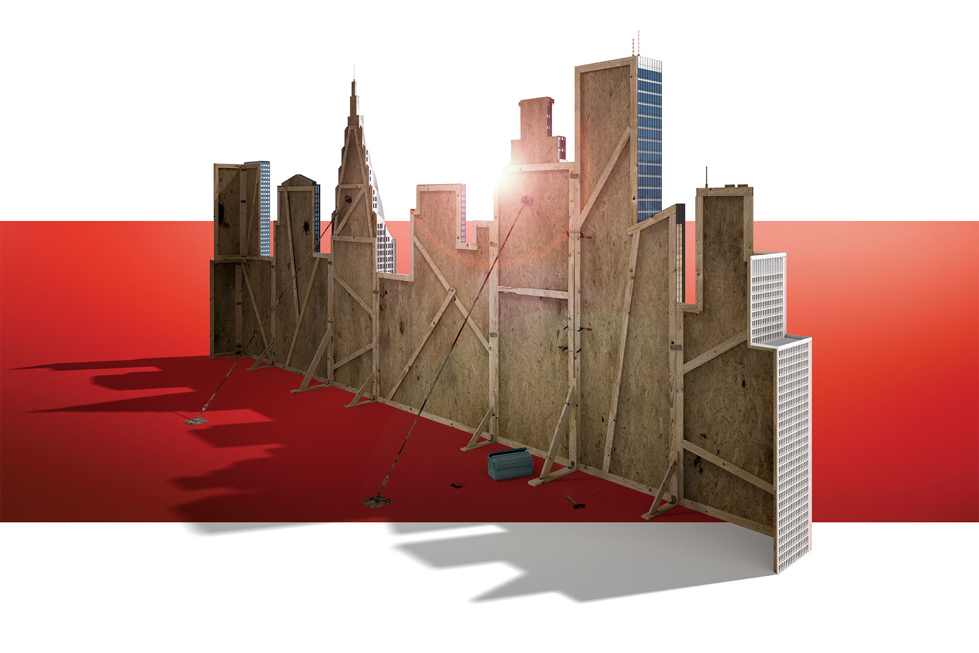Shilouette of stage model depicting several skyscrapers seen from behind. The skyscrapers on their front side look like the real thing, while their backside reveal that they are a facade made out of plywood.